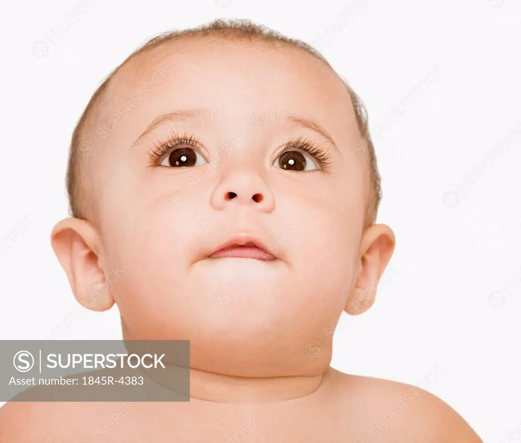 Close-up of a baby boy thinking