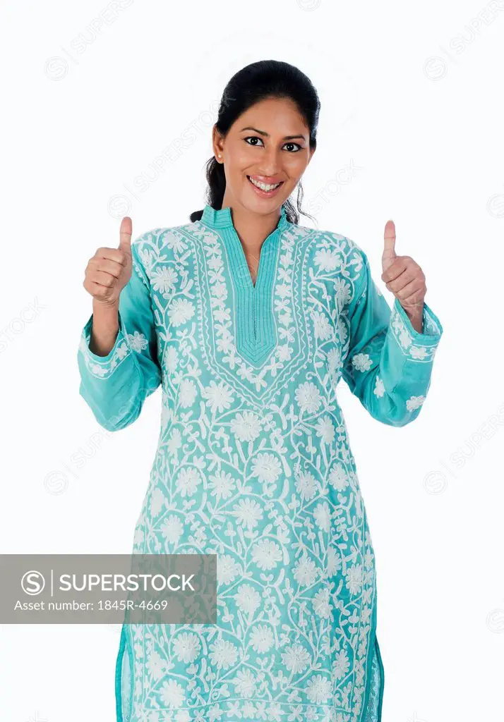 Woman showing thumbs up sign