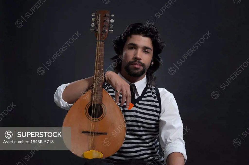 Musician holding a lute