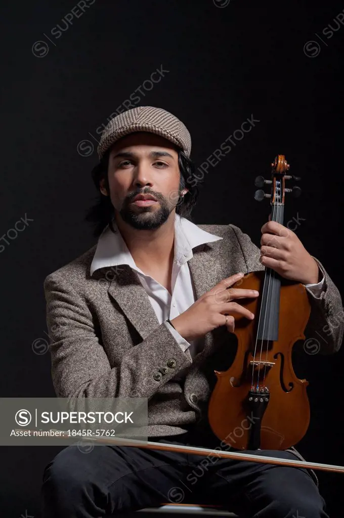 Musician holding a violin