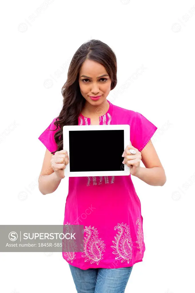 Portrait of a woman showing a digital tablet