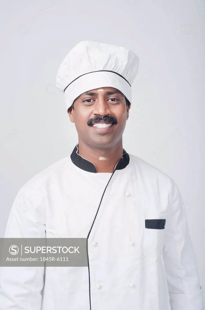 Portrait of a South Indian chef smiling
