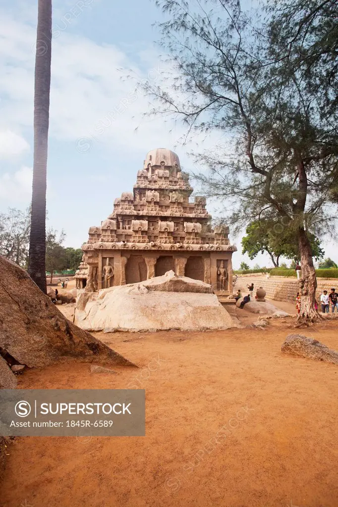 Tourists at ancient Pancha Rathas temple, Mahabalipuram, Kanchipuram District, Tamil Nadu, India