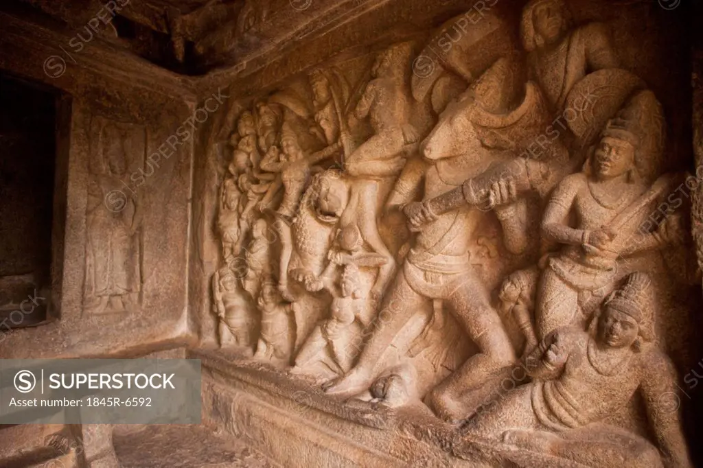 Bas Relief depicting conflict of Durga with Mahishasura at Mahishasuramardhini Mandapam, Mahabalipuram, Kanchipuram District, Tamil Nadu, India