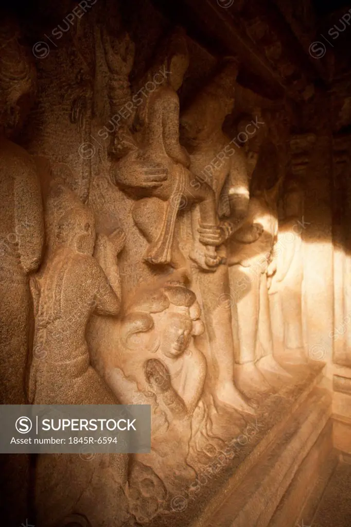 Carving details of Varaha saving the Goddess Earth from the flood at Varaha Cave Temple, Mahabalipuram, Kanchipuram District, Tamil Nadu, India