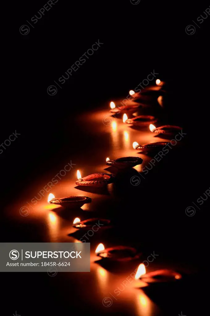 Close-up of Diwali oil lamps