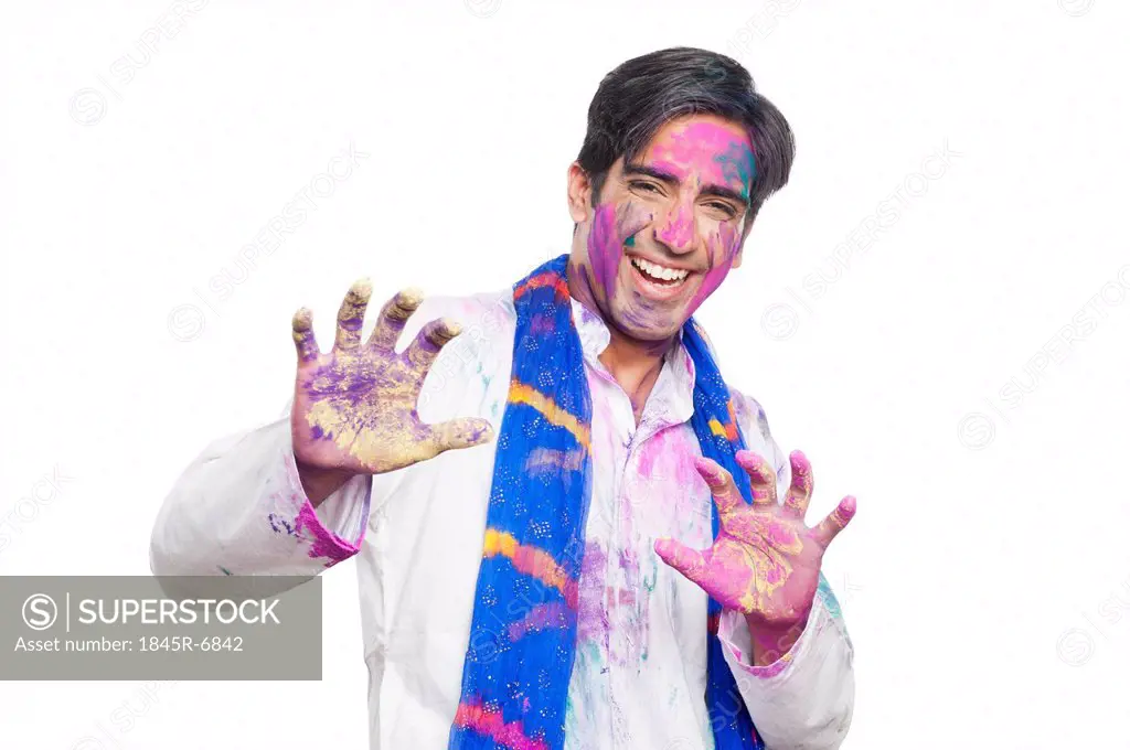 Portrait of a man celebrating Holi