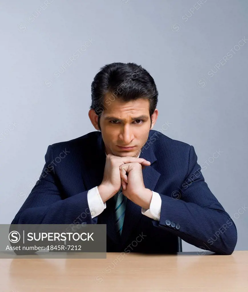Portrait of a businessman thinking