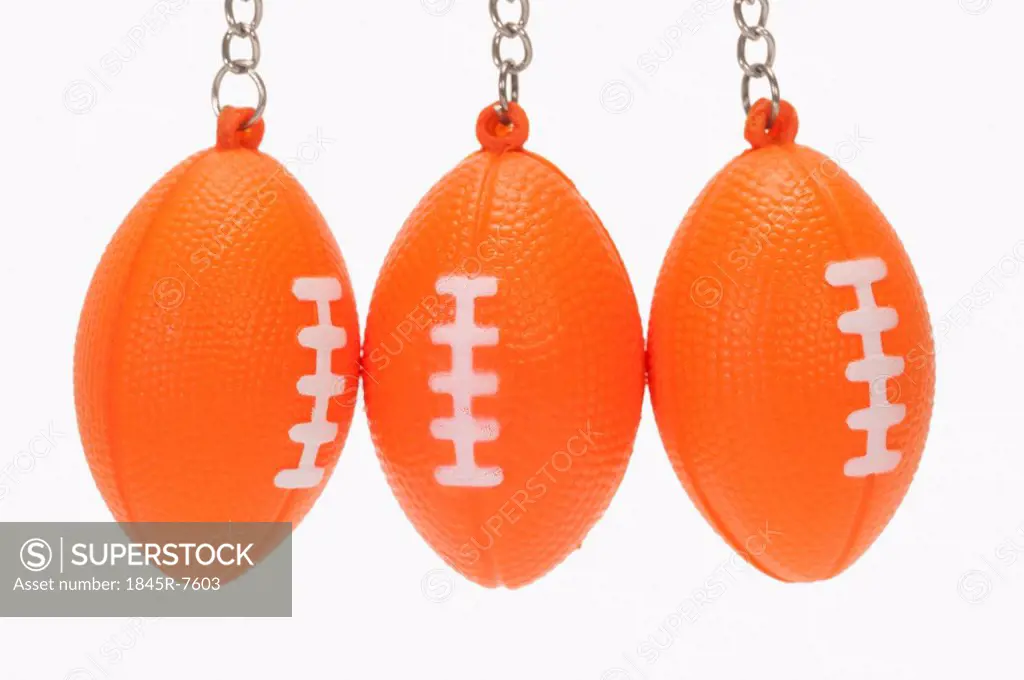 Close-up of American football shaped key rings