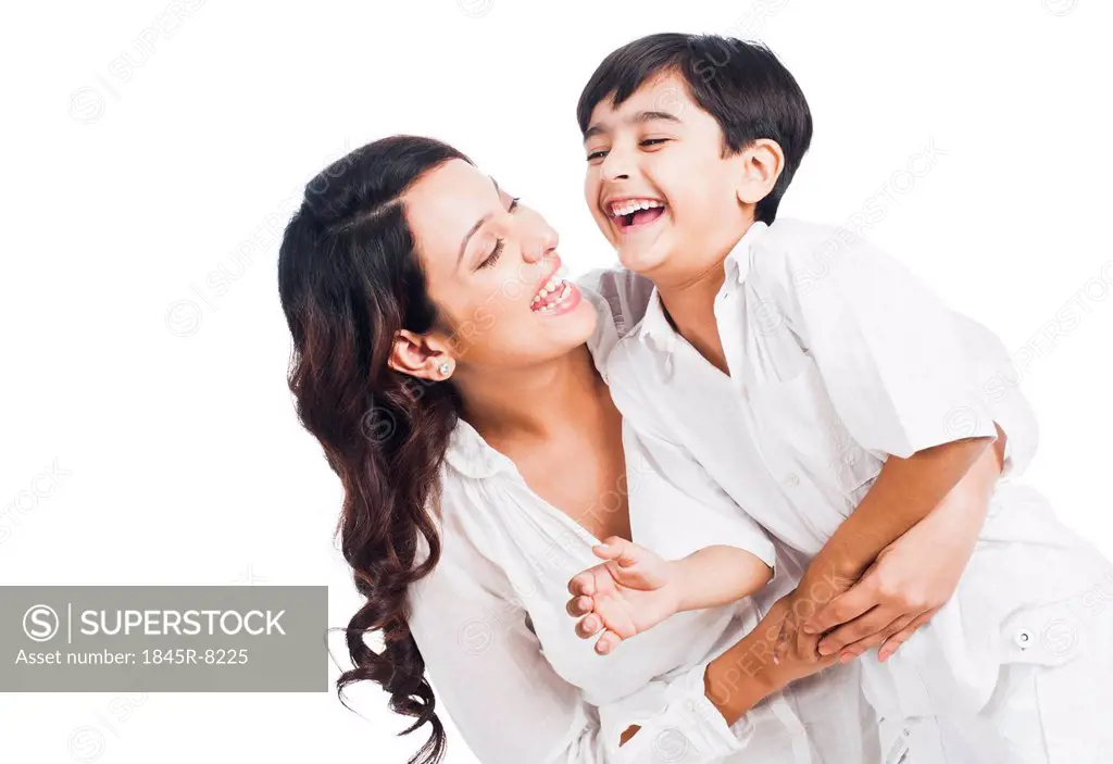 Happy mother and son smiling