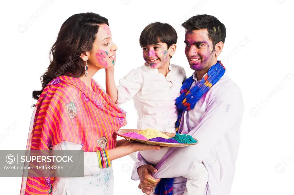 Family celebrating Holi festival