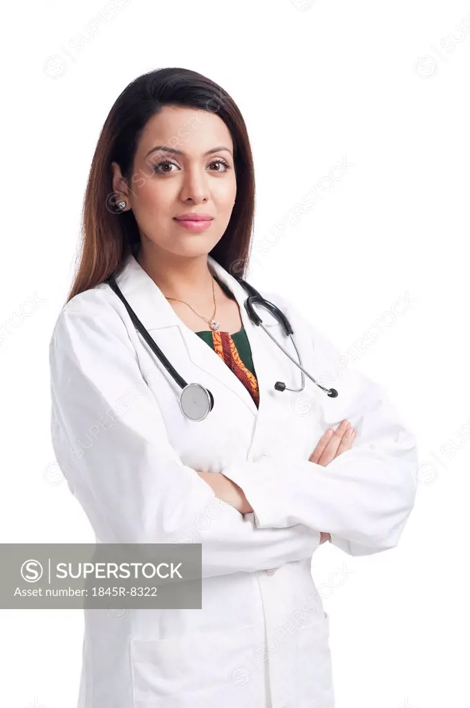 Female doctor standing with her arms crossed