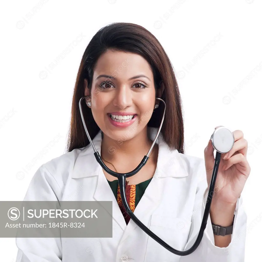 Portrait of a female doctor showing a stethoscope
