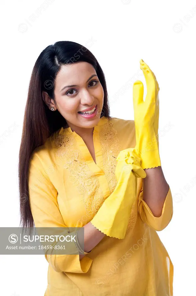 Portrait of a happy woman wearing gloves