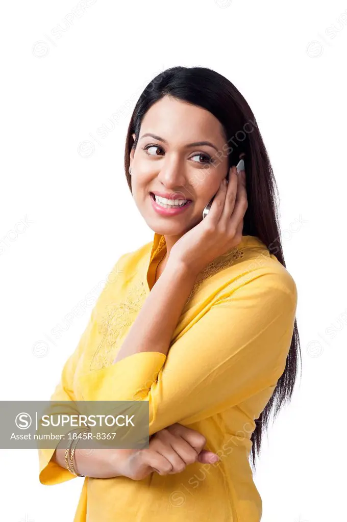 Woman talking on a mobile phone and smiling
