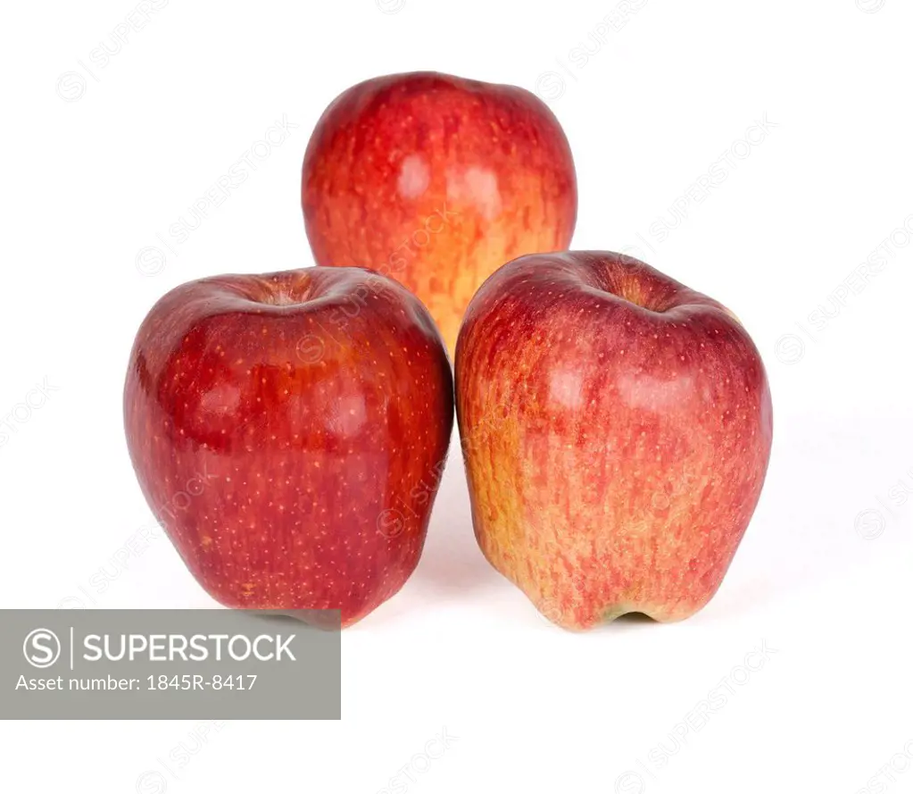 Close-up of three apples