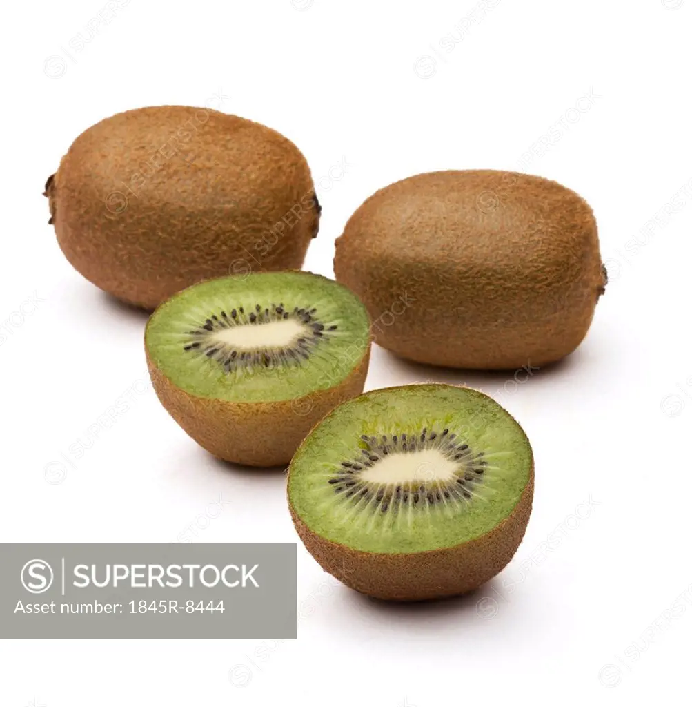 Close-up of kiwi fruits with halves