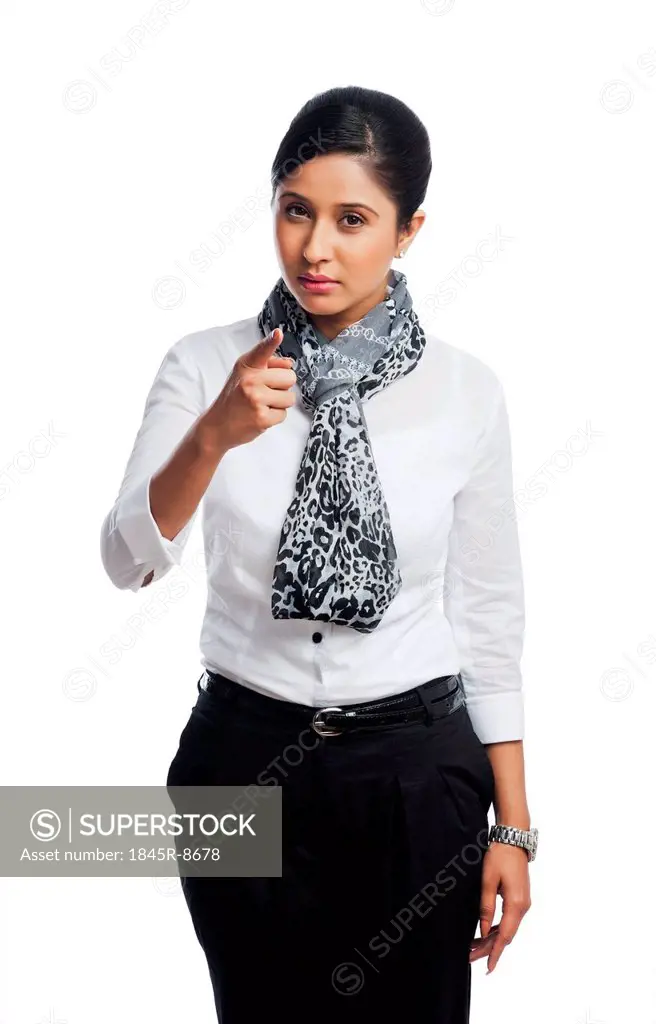 Portrait of a businesswoman pointing
