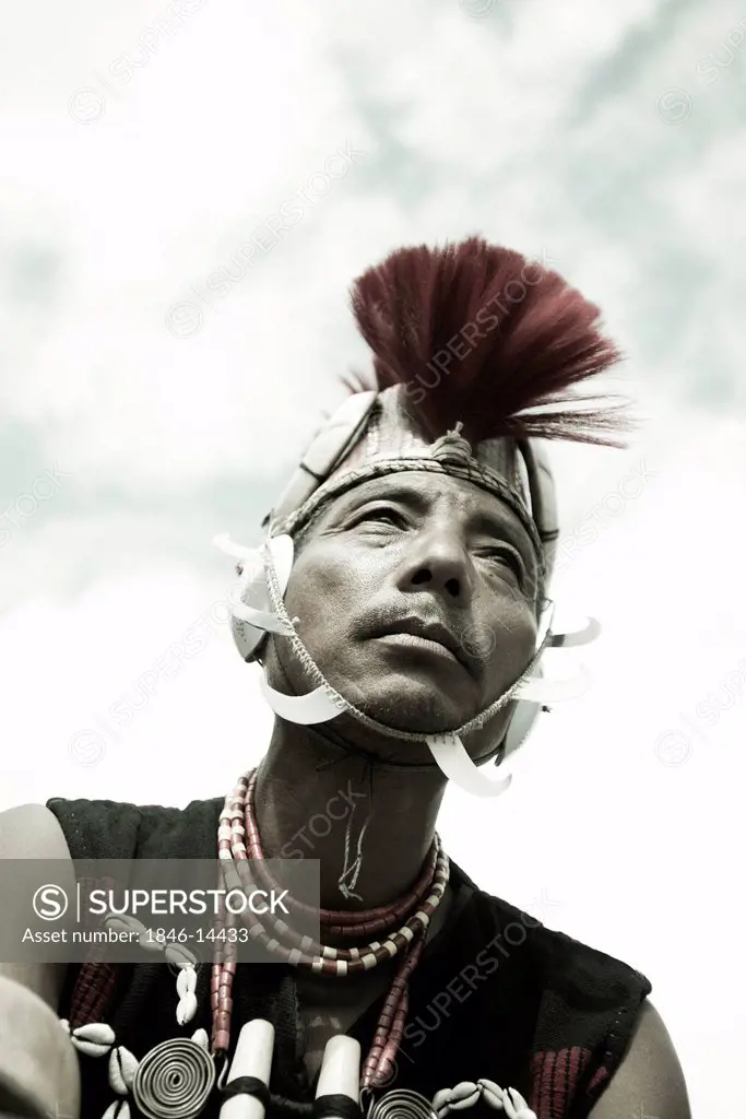 Naga tribal man in traditional outfit, Hornbill Festival, Kohima, Nagaland, India