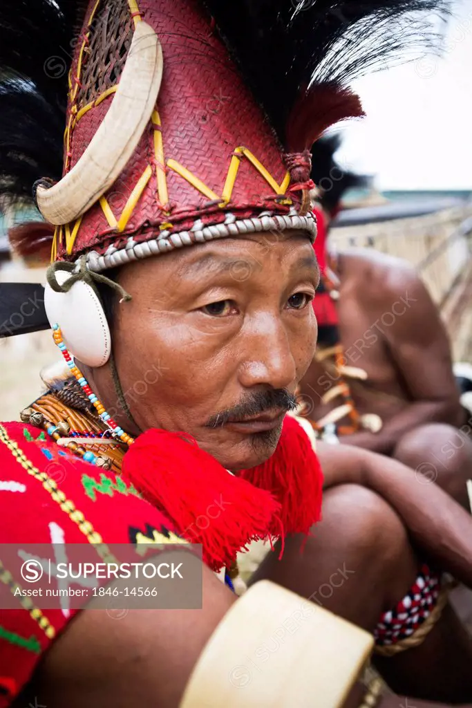 Naga tribesman in traditional outfit, Hornbill Festival, Kohima, Nagaland, India