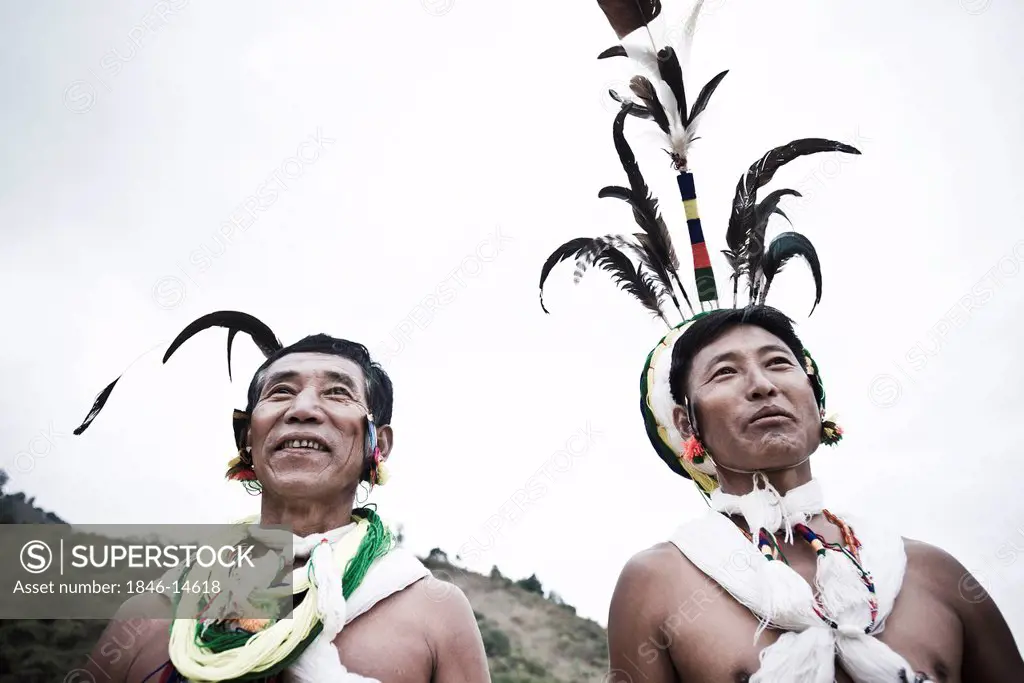 Two Naga tribal men in traditional outfit, Hornbill Festival, Kohima, Nagaland, India