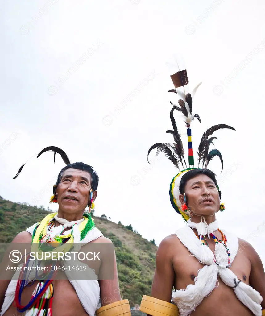Two Naga tribal men in traditional outfit, Hornbill Festival, Kohima, Nagaland, India