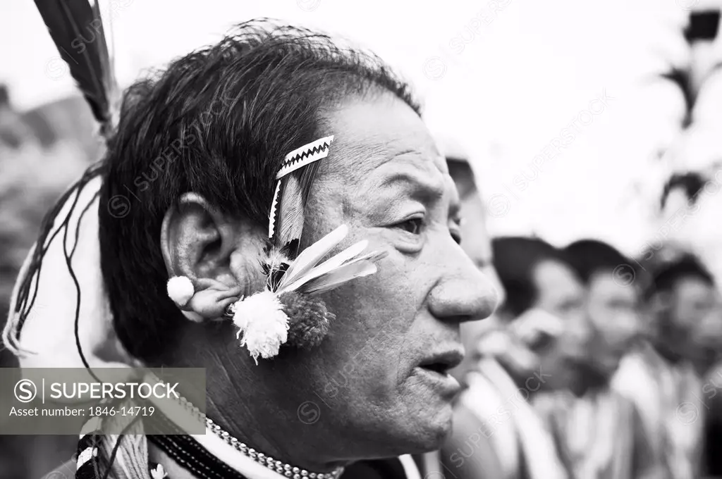 Naga tribesman in traditional outfit, Hornbill Festival, Kohima, Nagaland, India