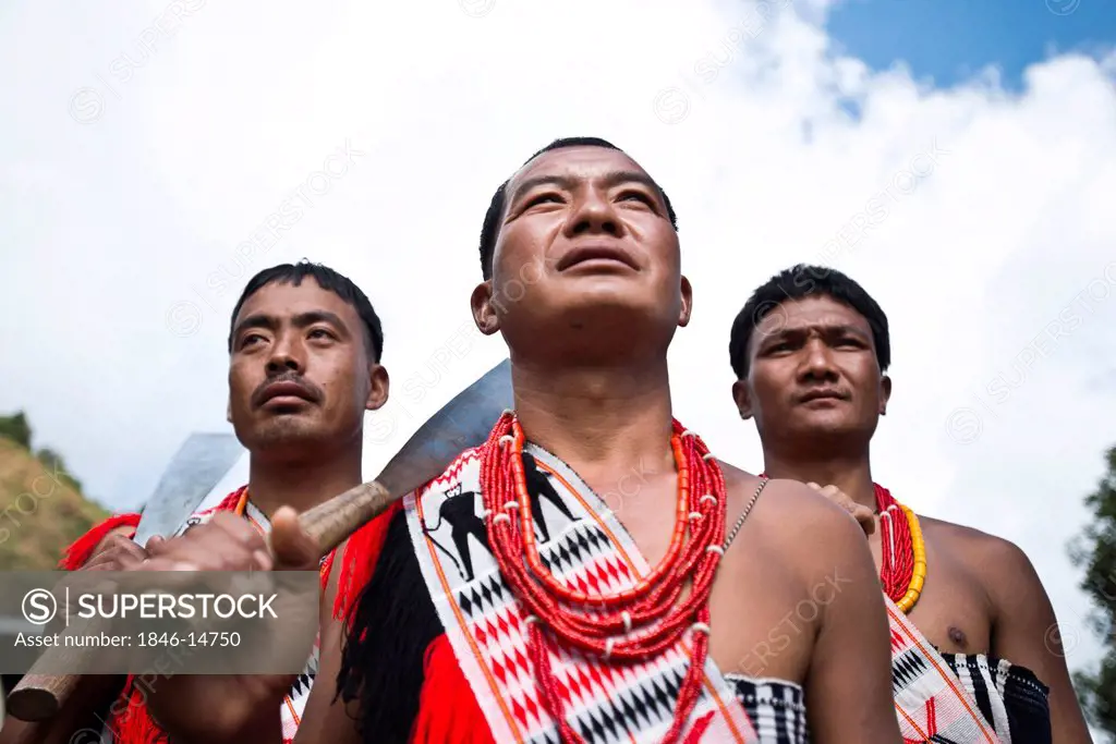 Naga tribesmen in traditional outfit during the annual Hornbill Festival at Kisama, Kohima, Nagaland, India