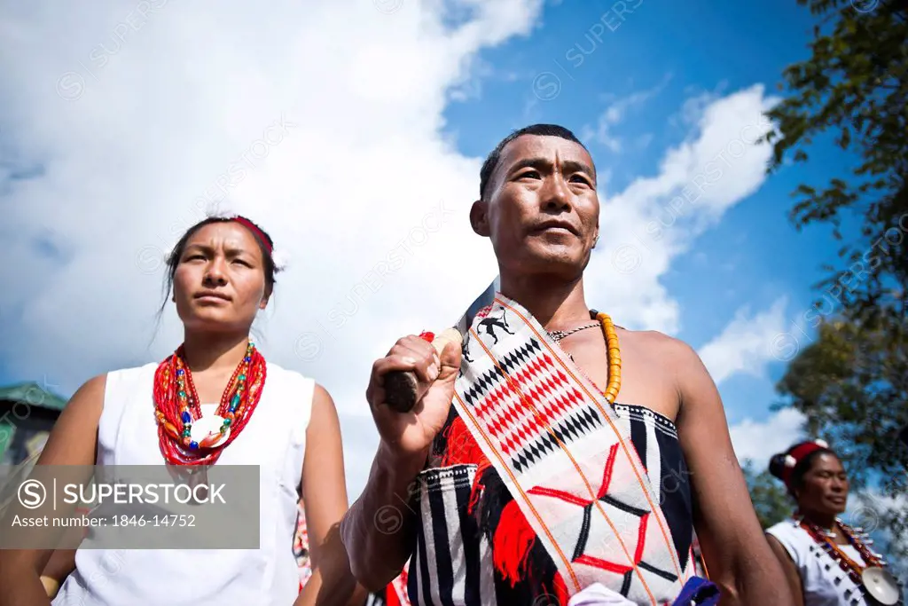 Naga tribal people in traditional outfit during the annual Hornbill Festival at Kisama, Kohima, Nagaland, India