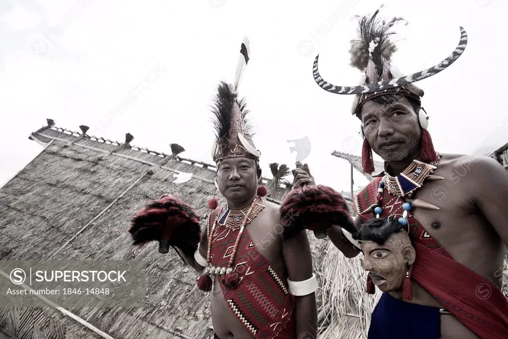 Naga tribesmen in traditional outfit during the annual Hornbill Festival at Kisama, Kohima, Nagaland, India