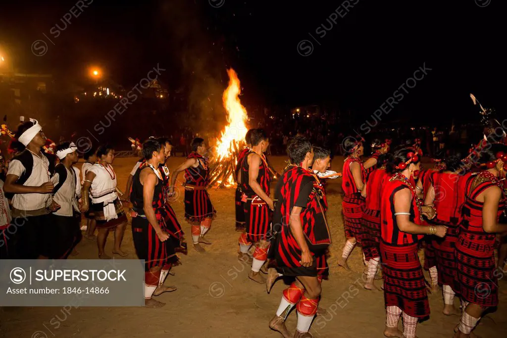 Naga tribal people in traditional outfit celebrating the annual Hornbill Festival at Kisama, Kohima, Nagaland, India