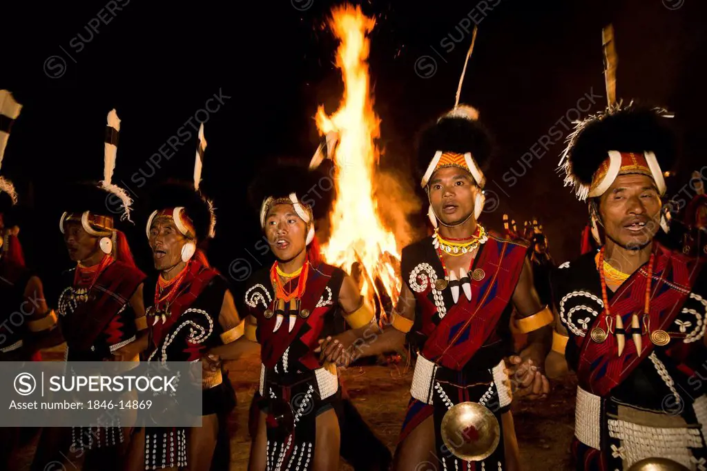 Naga tribesmen in traditional outfit celebrating the annual Hornbill Festival at Kisama, Kohima, Nagaland, India