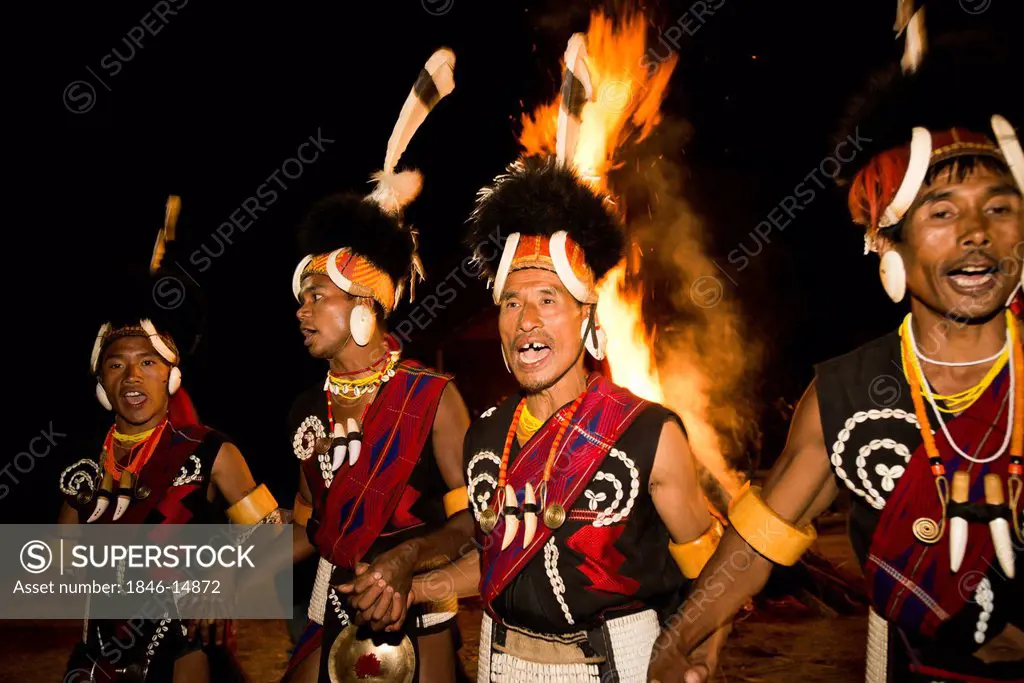 Naga tribesmen in traditional outfit celebrating the annual Hornbill Festival at Kisama, Kohima, Nagaland, India