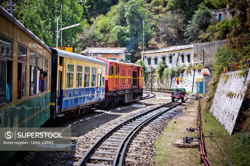 Train moving on railroad track, Shimla, Himachal Pradesh, India