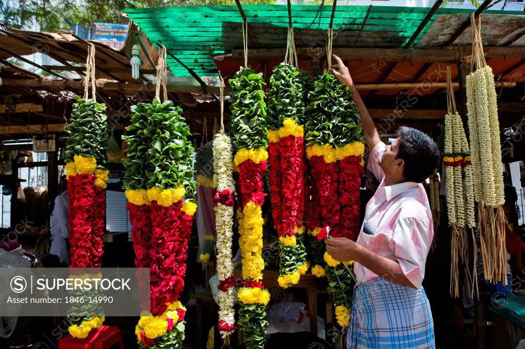 Garlands for sale hanging at a market stall, Chennai, Tamil Nadu, India