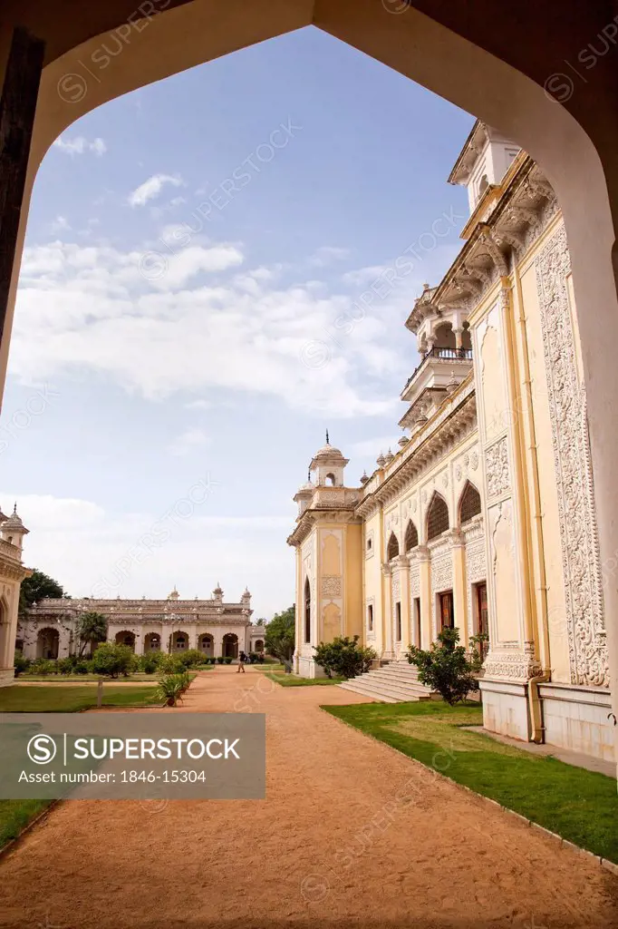 Facade of a palace viewed through arch, Chowmahalla Palace, Hyderabad, Andhra Pradesh, India