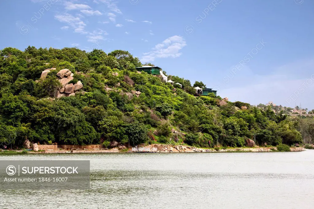 Lake with hill in the background, Durgam Cheruvu Lake, Rangareddy, Andhra Pradesh, India