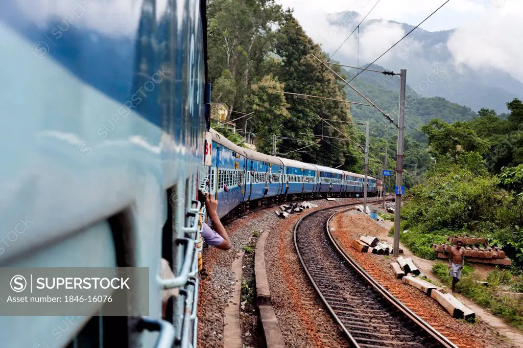 Train on railroad tracks, Visakhapatnam, Andhra Pradesh, India