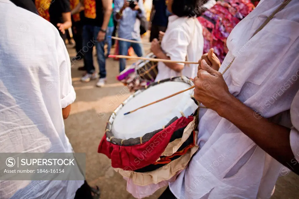 People playing percussion instrument in Durga puja festival, Delhi, India