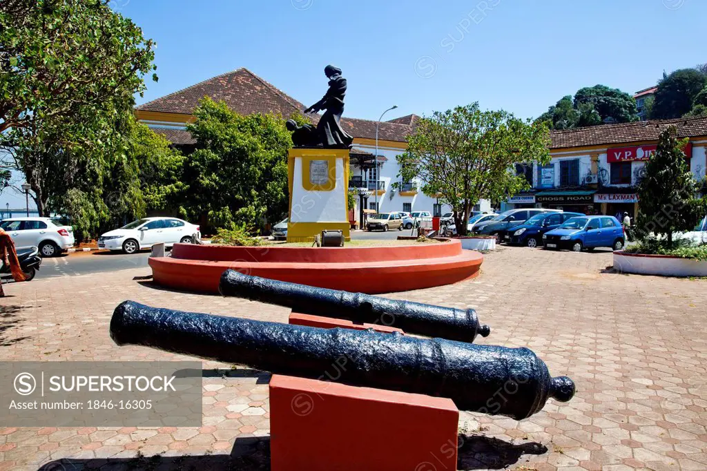 Cannons and the statue of Abbe Faria in Panaji, Goa, India