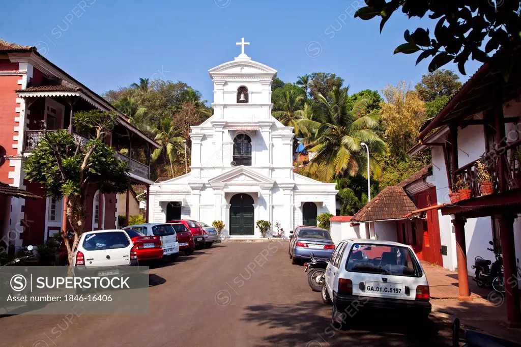 Cars parked outside a church, St Sebastian Chapel, Panaji, North Goa, Goa, India