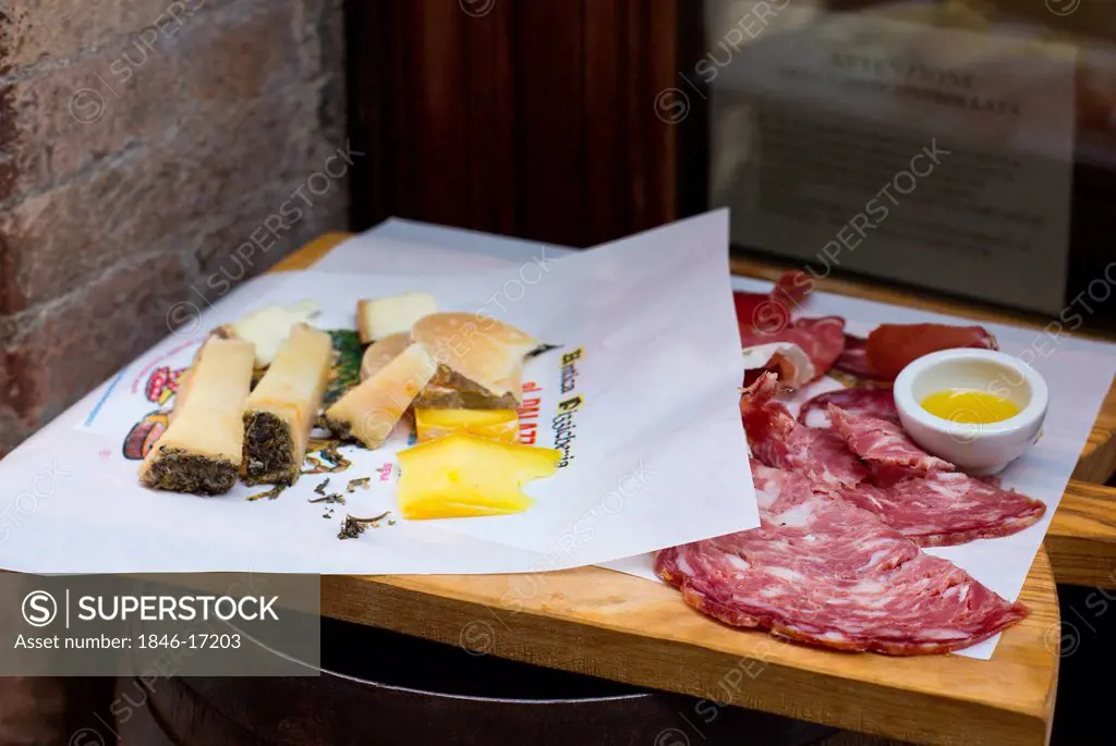 Italian food on a table in a restaurant, Siena, Tuscany, Italy