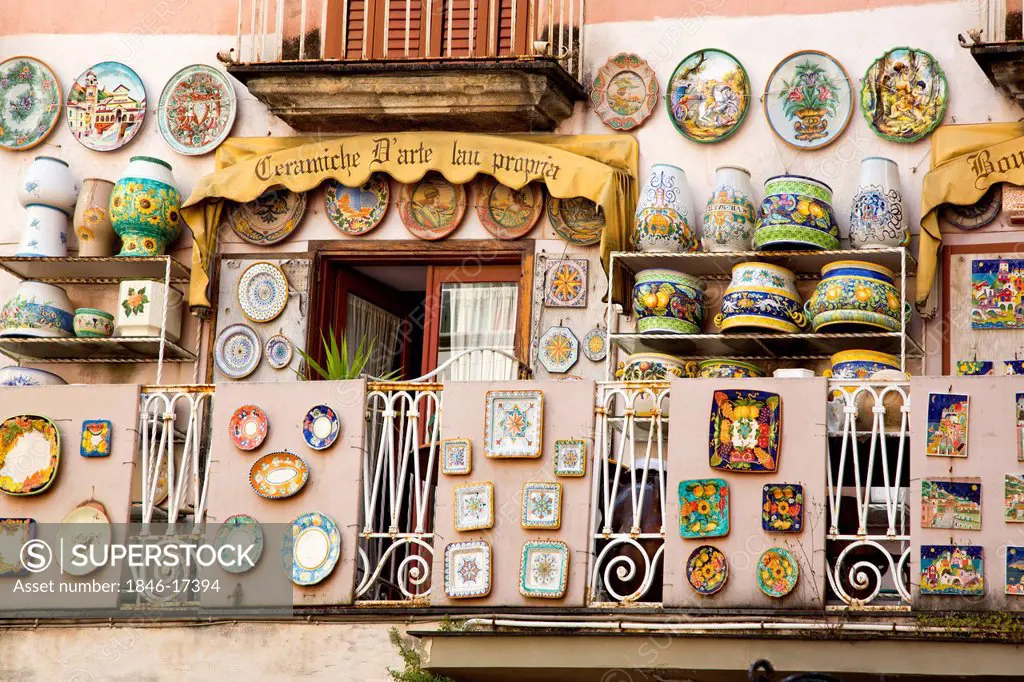 Ceramic souvenirs for sale displayed outside shop on Piazza Duomo, Amalfi, Province of Salerno, Campania, Italy