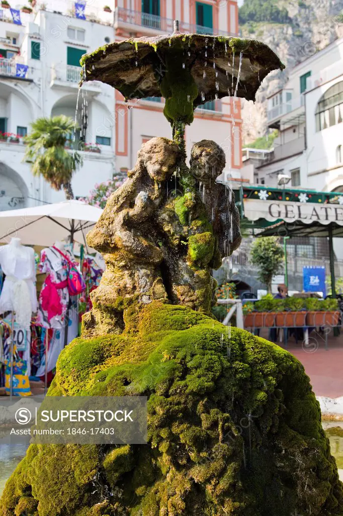 Statues of a mossy fountain, Piazza Duomo, Amalfi, Province of Salerno, Campania, Italy