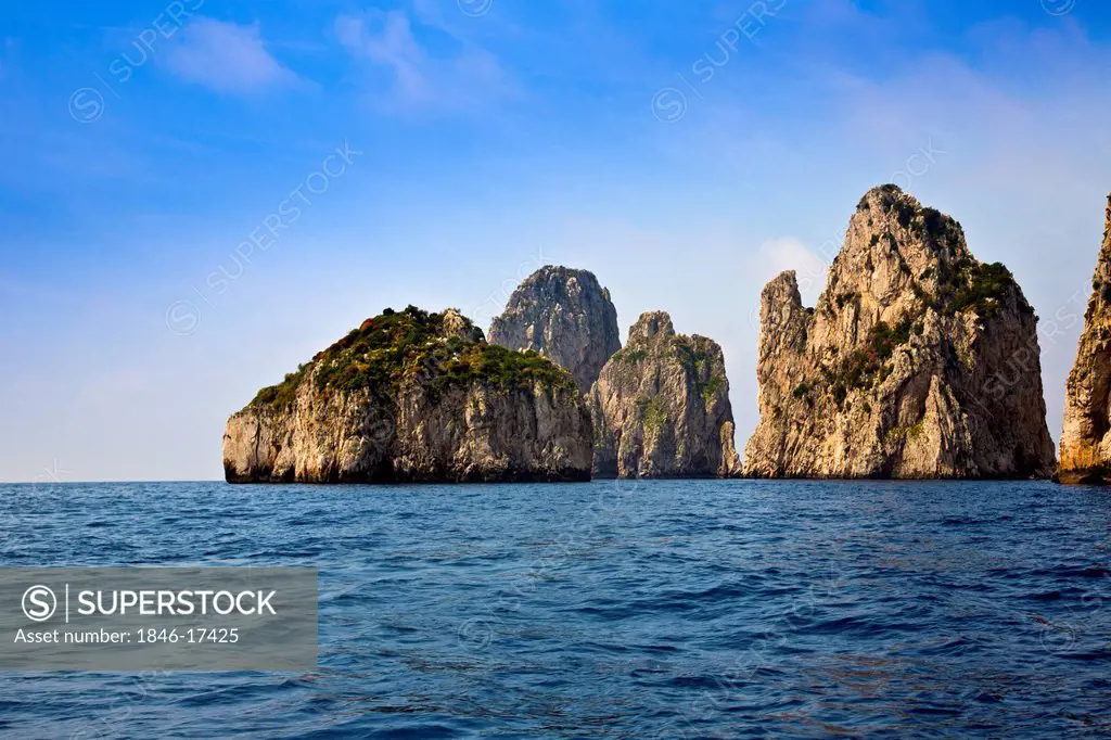 Limestone cliffs and cave in the sea, Capri, Campania, Italy