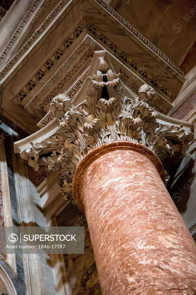 Low angle view of a details of a column in a basilica, St. Peter's Basilica, Vatican City, Rome, Lazio, Italy
