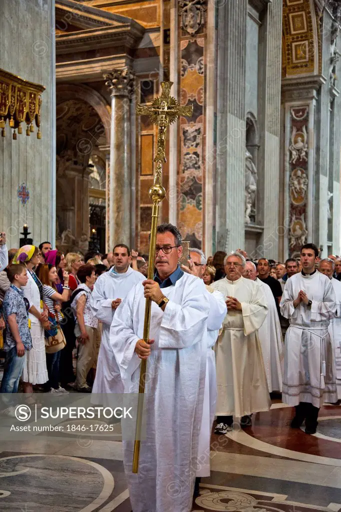 People praying in the St. Peter's Basilica, Vatican City, Rome, Lazio, Italy