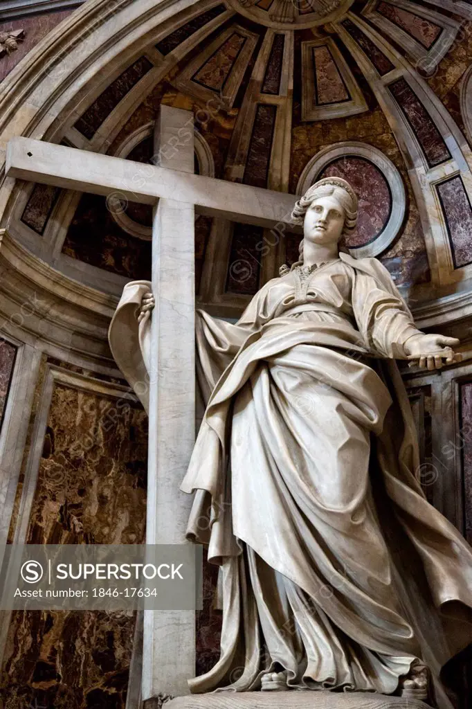 Statue of Jesus Christ with cross in a basilica, St. Peter's Basilica, Vatican City, Rome, Lazio, Italy