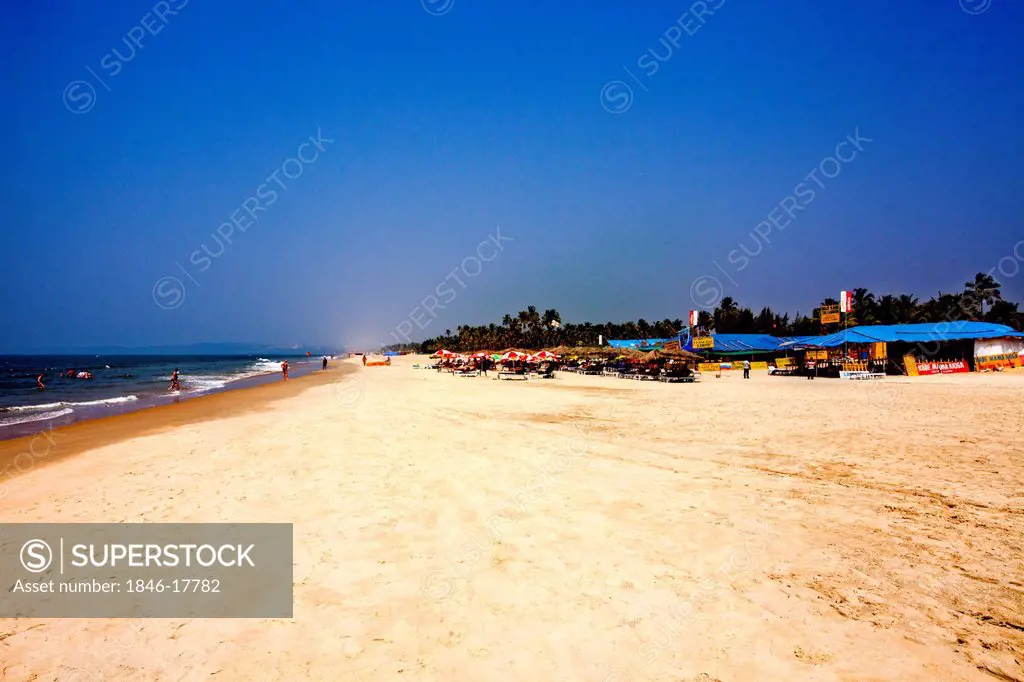 Tourists on the beach, Majorda Beach, Majorda, South Goa, Goa, India