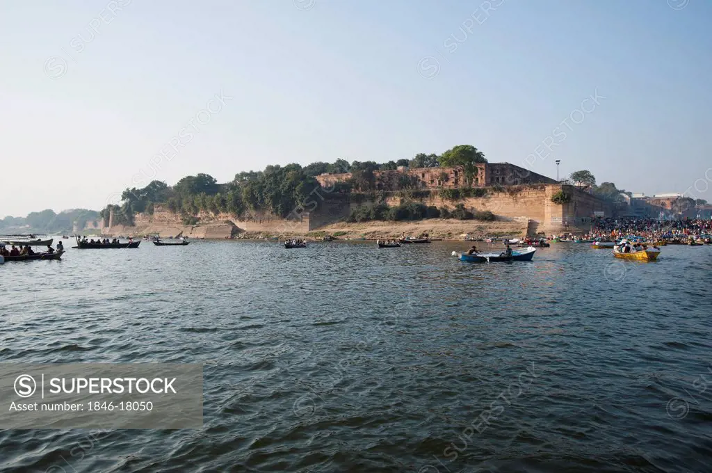 Boats in the Ganges River with fort in the background, Allahabad, Uttar Pradesh, India